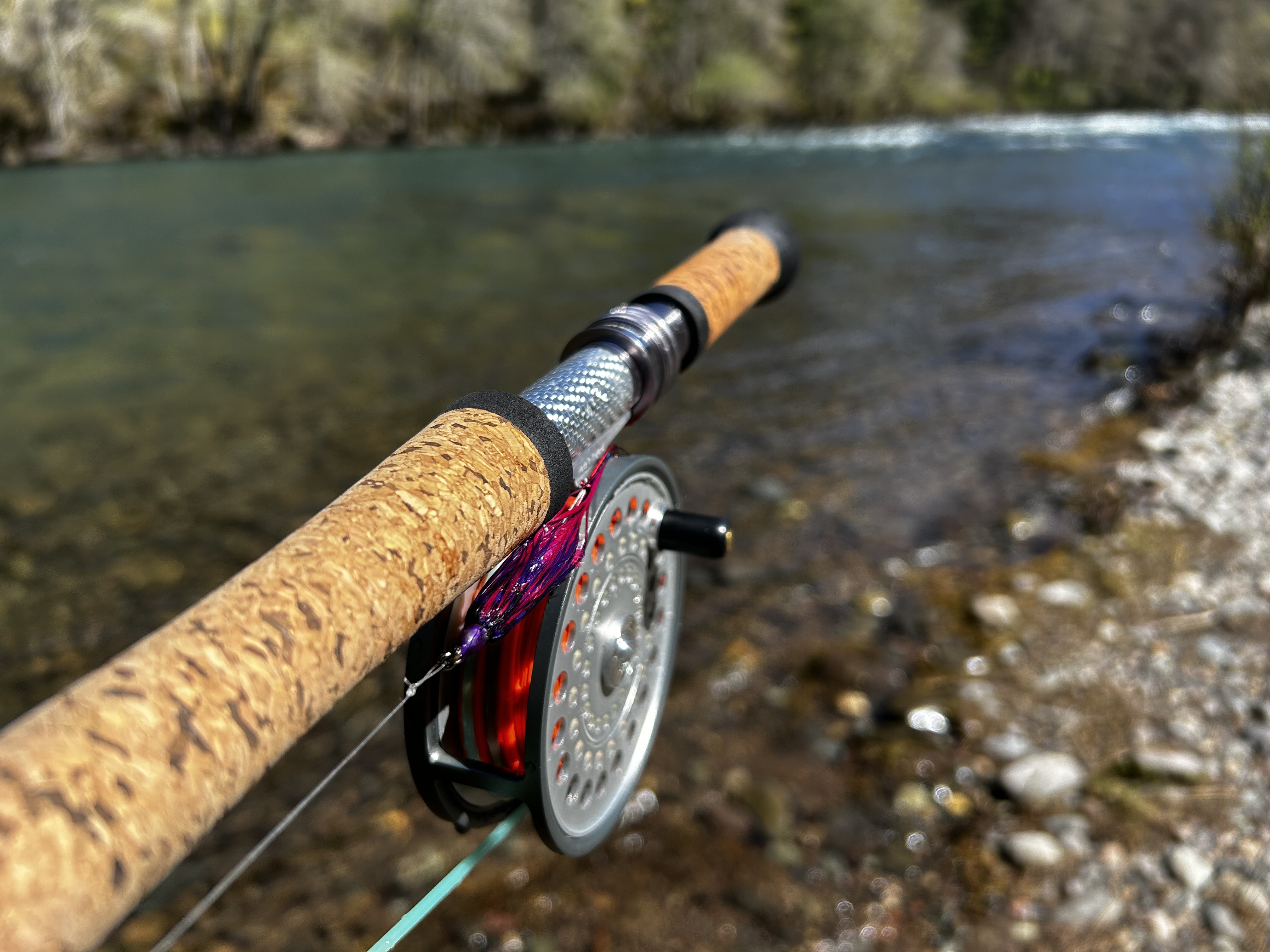 Cork handle fly reel on river